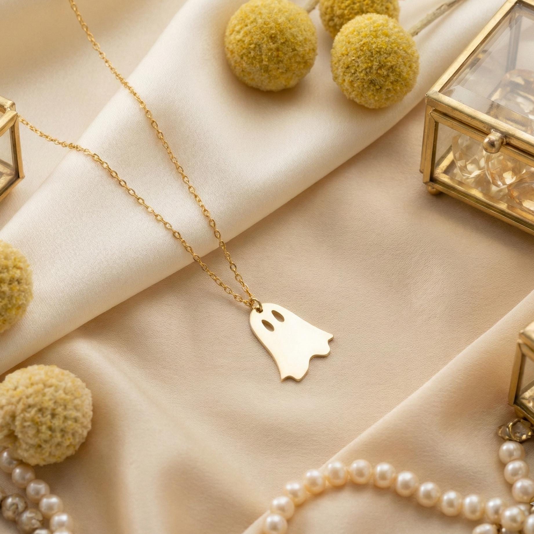 Minimalist gold ghost necklace pendant on a model, cute spooky mama jewelry gift for mothers day, dainty charm necklace aesthetic