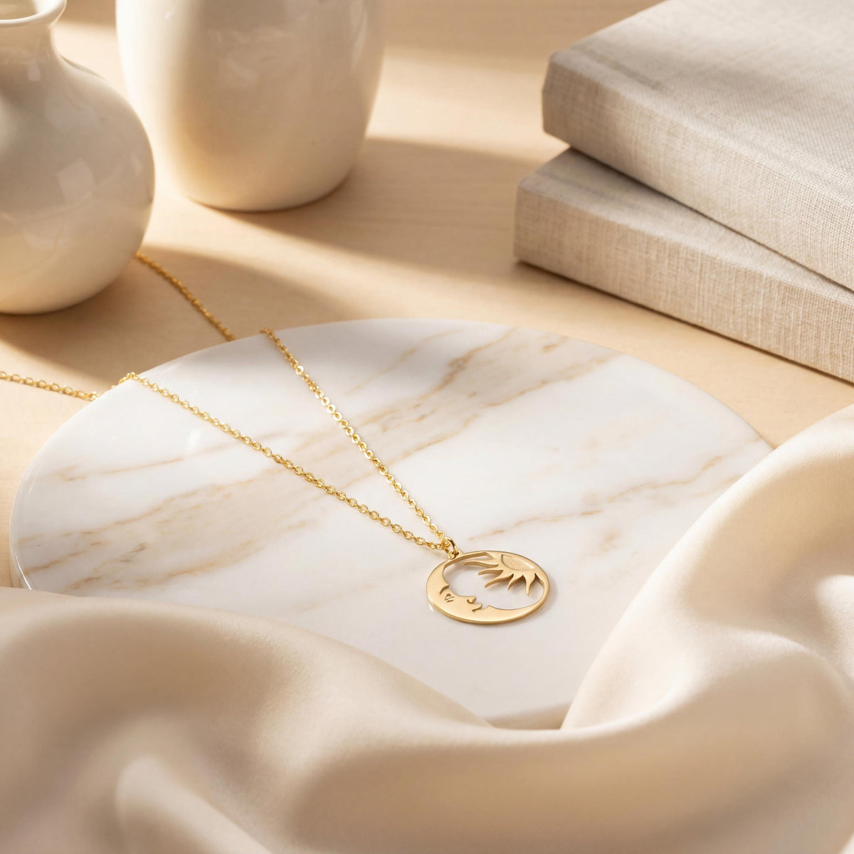 14K gold plated dainty sun and crescent moon face pendant necklace worn by a woman, celestial minimalist boho jewelry.